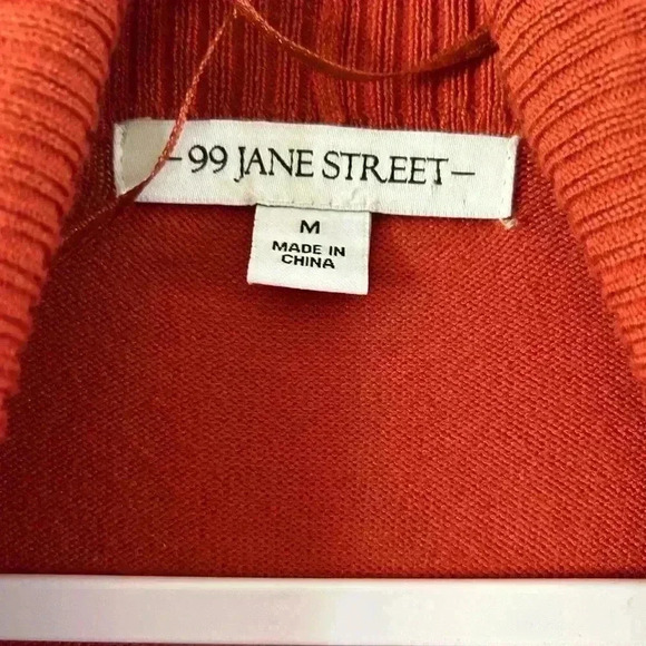 99 Jane Street orange sweater. Medium. Gently used. Button on cuffs. - Picture 2 of 3